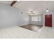 Spacious living room with wood-look flooring and high ceilings at 1163 Queen Elaine Dr, Casselberry, FL 32707