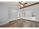 Spacious living room with wood-look flooring and high ceilings at 1163 Queen Elaine Dr, Casselberry, FL 32707