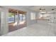 Living room, kitchen and view of the patio at 1163 Queen Elaine Dr, Casselberry, FL 32707
