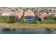 Backyard oasis with pool and lake view at 12088 Uleta Ln, Orlando, FL 32827