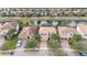 Community view showcasing lake, homes, and landscaping at 12088 Uleta Ln, Orlando, FL 32827