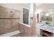 Elegant bathroom with a large shower and double vanity at 12088 Uleta Ln, Orlando, FL 32827