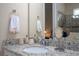 Bathroom features granite countertop and modern sink at 12088 Uleta Ln, Orlando, FL 32827