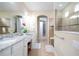 Spa-like bathroom with double vanity and large shower at 12088 Uleta Ln, Orlando, FL 32827