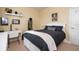 Bedroom with queen bed, desk and eclectic decor at 12088 Uleta Ln, Orlando, FL 32827