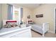 Two twin beds in a bedroom with car themed decor at 12088 Uleta Ln, Orlando, FL 32827