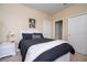 Cozy bedroom with a queen-size bed and plenty of closet space at 12088 Uleta Ln, Orlando, FL 32827