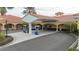 Community gas station with covered carport at 12088 Uleta Ln, Orlando, FL 32827