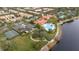 Community overview with lakefront pool and tennis courts at 12088 Uleta Ln, Orlando, FL 32827