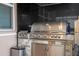 High-end stainless steel grill with side burner at 12088 Uleta Ln, Orlando, FL 32827