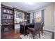 Spacious home office features built-in shelving and a large desk at 12088 Uleta Ln, Orlando, FL 32827