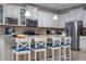 Modern kitchen with stainless steel appliances and an island at 12088 Uleta Ln, Orlando, FL 32827