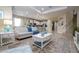 Open living room showcasing a spacious layout and stylish furnishings at 12088 Uleta Ln, Orlando, FL 32827