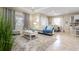 Bright living room with ample natural light and comfortable seating at 12088 Uleta Ln, Orlando, FL 32827