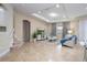 Spacious living room with neutral decor and large windows at 12088 Uleta Ln, Orlando, FL 32827