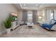 Bright and airy living room with comfortable seating at 12088 Uleta Ln, Orlando, FL 32827