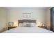 Serene Primary bedroom with neutral tones and plush bedding at 12088 Uleta Ln, Orlando, FL 32827