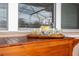 Wooden outdoor bar with lemonade and glasses at 12088 Uleta Ln, Orlando, FL 32827