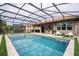 Large, refreshing pool and spa with screened enclosure at 12088 Uleta Ln, Orlando, FL 32827