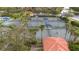 Community tennis courts with shade structures at 12088 Uleta Ln, Orlando, FL 32827