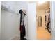 Spacious walk-in closet with ample shelving and hanging space at 12088 Uleta Ln, Orlando, FL 32827