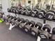 Well-equipped weight room with dumbbells and machines at 12088 Uleta Ln, Orlando, FL 32827