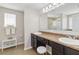 Double vanity bathroom with granite countertop at 131 Cambria Grove Cir, Davenport, FL 33837
