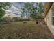 Spacious backyard with playset and firepit area at 1404 Adair St, Ocoee, FL 34761