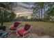 Relaxing backyard with patio furniture and grassy area at 1404 Adair St, Ocoee, FL 34761