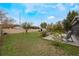 Spacious backyard with grassy area and shed at 14528 Lycastle Cir, Orlando, FL 32826