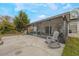 Backyard with screened patio and rocking chairs at 14528 Lycastle Cir, Orlando, FL 32826