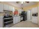 Kitchen with stainless steel appliances and white cabinets at 14528 Lycastle Cir, Orlando, FL 32826