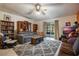 Cozy living room with ample seating and access to the back porch at 14528 Lycastle Cir, Orlando, FL 32826