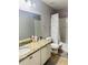 Bathroom with granite countertop and white cabinets at 15269 Galbi Dr, Orlando, FL 32828