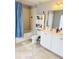 Bathroom with double vanity and a shower/tub combo at 15269 Galbi Dr, Orlando, FL 32828