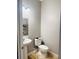 Small bathroom with pedestal sink and toilet at 15269 Galbi Dr, Orlando, FL 32828