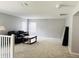 Spacious bonus room with neutral walls and plush carpeting at 15269 Galbi Dr, Orlando, FL 32828