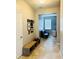 Hallway with built-in bench and small sitting area at 15269 Galbi Dr, Orlando, FL 32828