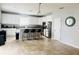 Kitchen with white cabinets, granite countertops, and stainless steel appliances at 15269 Galbi Dr, Orlando, FL 32828