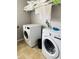 Bright laundry room, featuring a washer and dryer at 15269 Galbi Dr, Orlando, FL 32828