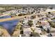Aerial view of neighborhood with lake at 1633 Corner Meadow Cir, Orlando, FL 32820