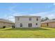 Two-story house with a large backyard at 1633 Corner Meadow Cir, Orlando, FL 32820