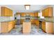 Spacious kitchen with granite countertops, stainless appliances, and ample cabinetry at 1633 Corner Meadow Cir, Orlando, FL 32820