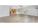 Living room features hardwood flooring and easy access to the kitchen at 1633 Corner Meadow Cir, Orlando, FL 32820