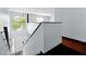 View from the second floor looking down the staircase and entryway at 1633 Corner Meadow Cir, Orlando, FL 32820