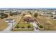 Aerial view of a house, showing the property and neighborhood at 1719 North W Blvd, Davenport, FL 33837