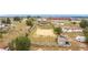 Aerial view showing the property's backyard, and surrounding houses and buildings at 1719 North W Blvd, Davenport, FL 33837
