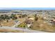 Aerial view of a house with surrounding land and other houses at 1719 North W Blvd, Davenport, FL 33837
