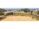 Large backyard with a shed and mostly sandy open area at 1719 North W Blvd, Davenport, FL 33837
