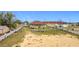 Large backyard with a fenced area and a mostly sandy open area at 1719 North W Blvd, Davenport, FL 33837
